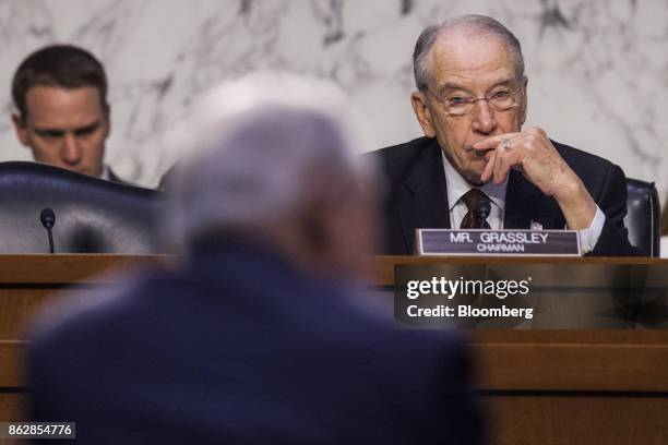 Senator Chuck Grassley, a Republican from Iowa and chairman of the Senate Judiciary Committee, listens during a hearing with Jeff Sessions, U.S....