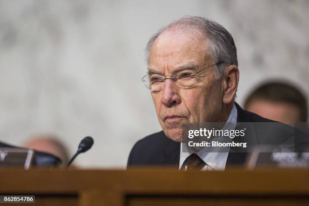 Senator Chuck Grassley, a Republican from Iowa and chairman of the Senate Judiciary Committee, listens during a hearing with Jeff Sessions, U.S....