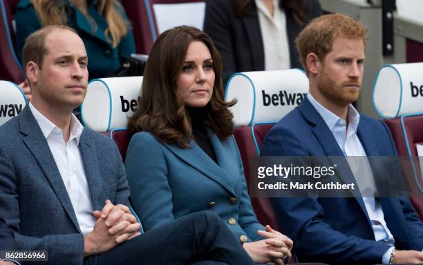 Prince William, Duke of Cambridge and Catherine, Duchess of Cambridge with Prince Harry attend the Coach Core graduation ceremony for more than 150...