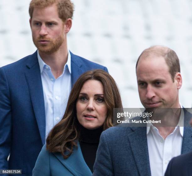 Prince William, Duke of Cambridge and Catherine, Duchess of Cambridge with Prince Harry attend the Coach Core graduation ceremony for more than 150...