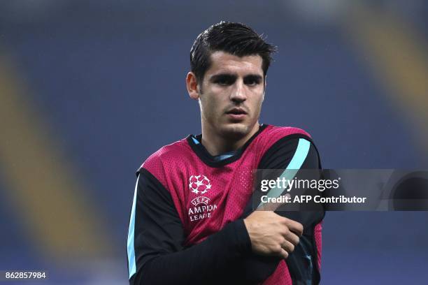 Chelsea's Spanish striker Alvaro Morata warms up before a UEFA Champions league group stage football match between Chelsea and Roma at Stamford...