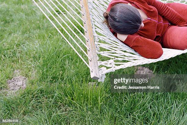 woman sleeping on hammock - jessamyn harris stock pictures, royalty-free photos & images