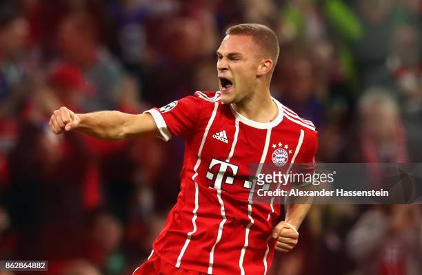 Joshua Kimmich of Bayern Muenchen celebrates scoring his sides second goal during the UEFA Champions League group B match between Bayern Muenchen and...