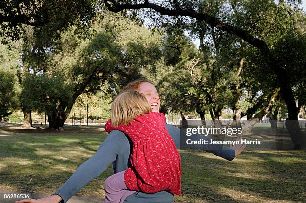 daughter hugging mother - jessamyn harris stock pictures, royalty-free photos & images