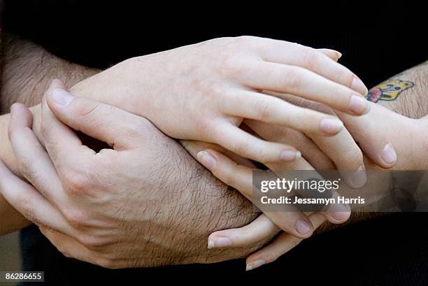 man and woman's hands - jessamyn harris stock pictures, royalty-free photos & images