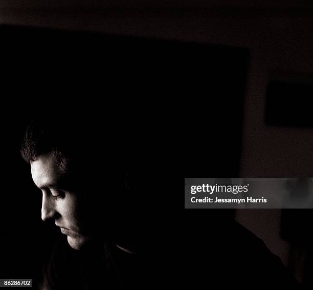 pensive man - jessamyn harris stock pictures, royalty-free photos & images