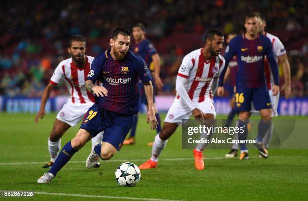 Lionel Messi of Barcelona in action during the UEFA Champions League group D match between FC Barcelona and Olympiakos Piraeus at Camp Nou on October...