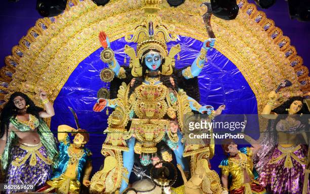 Hindu Goddess Kali Idol at the a city Puja Pandal during Hindu festival Kali Puja and Deepawali festival on October 18,2017 in Kolkata,India.