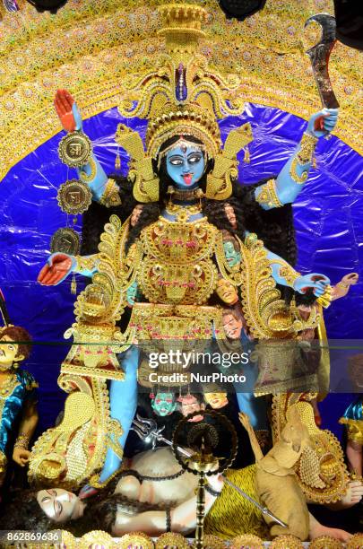 Hindu Goddess Kali Idol at the a city Puja Pandal during Hindu festival Kali Puja and Deepawali festival on October 18,2017 in Kolkata,India.