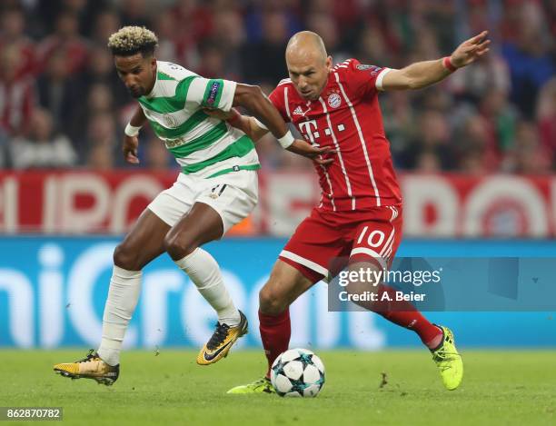 Arjen Robben of FC Bayern Muenchen fights for the ball with Scott Sinclair of Celtic FC during the UEFA Champions League group B match between Bayern...