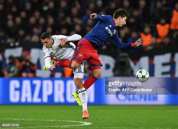 Basel's defender from Czech Republic Marek Suchy and CSKA Moscow's forward from Russia Timur Zhamaletdinov vie for the ball during the UEFA Champions...