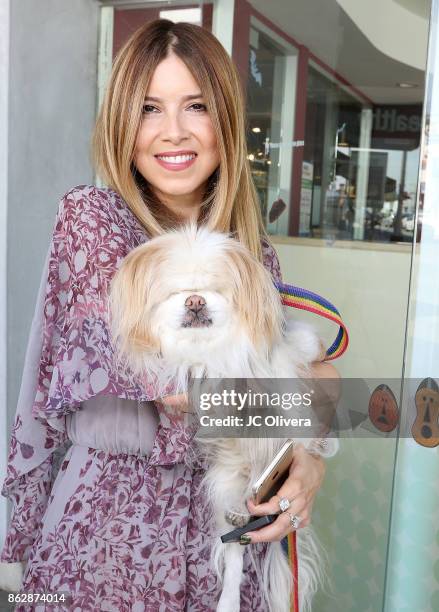 Simone Reyes attends a press conference celebrating Calfornia Governor Jerry Brown signing California assembly Bill 485: The Pet Rescue and Adoption...