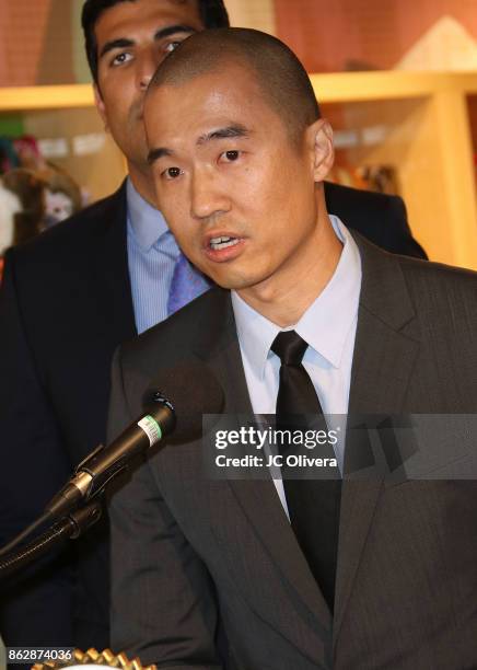 Healthy Spot owner Andrew Kim speaks during a press conference celebrating Calfornia Governor Jerry Brown signing California assembly Bill 485: The...