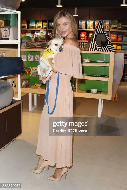 Model Joanna Krupa attends a press conference celebrating Calfornia Governor Jerry Brown signing California assembly Bill 485: The Pet Rescue and...