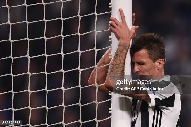 Juventus' forward from Croatia Mario Mandzukic reacts during the UEFA Champions League Group D football match Juventus vs Sporting CP at the Juventus...