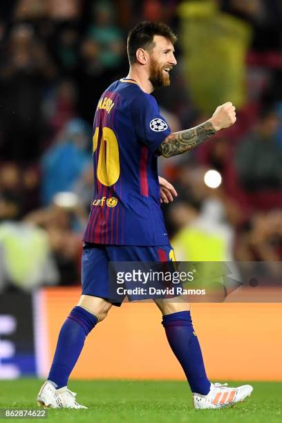 Lionel Messi of Barcelona celebrates after scoring his sides second goal during the UEFA Champions League group D match between FC Barcelona and...