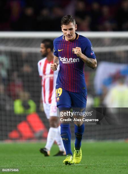 Lucas Digne of Barcelona celebrates after scoring his sides third goal during the UEFA Champions League group D match between FC Barcelona and...