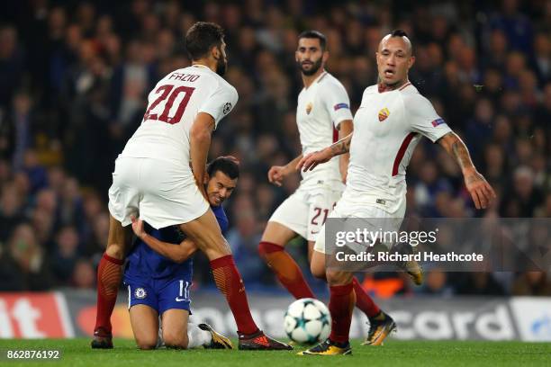 Federico Fazio of AS Roma and Pedro of Chelsea colide during the UEFA Champions League group C match between Chelsea FC and AS Roma at Stamford...