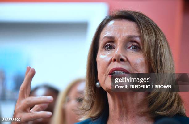 House Democratic Leader Nancy Pelosi gestures while speaking with young immigrants protected by DACA and community leaders during a meeting in Los...