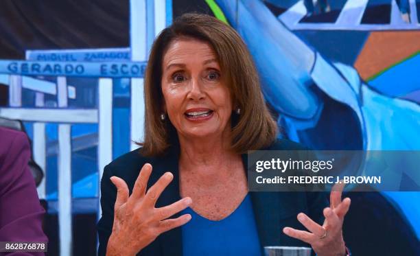 House Democratic Leader Nancy Pelosi gestures while speaking with young immigrants protected by DACA and community leaders during a meeting in Los...