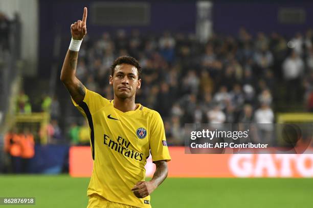 Paris Saint-Germain's Brazilian forward Neymar celebrates scoring a goal during the UEFA Champions League Group B football match between RSC...