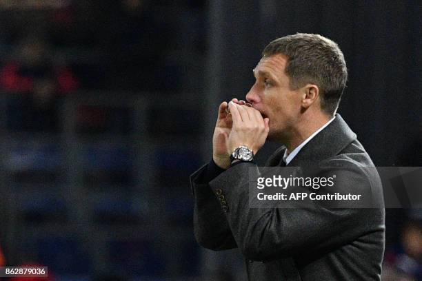 Moscow's coach from Belarus Viktor Goncharenko gives instructions to his players during the UEFA Champions League Group A football match between PFC...