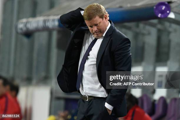 Anderlecht's Belgian head coach Hein Vanhaezebrouck reacts at the end of the UEFA Champions League Group B football match between RSC Anderlecht and...