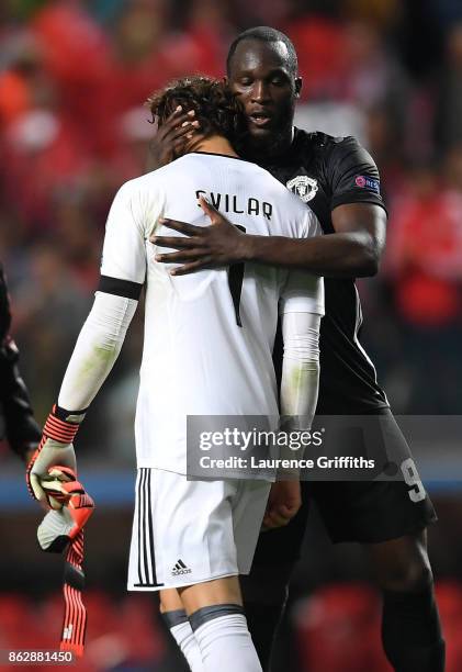 Romelu Lukaku of Manchester United and Mile Svilar of Benfica embrace after the UEFA Champions League group A match between SL Benfica and Manchester...
