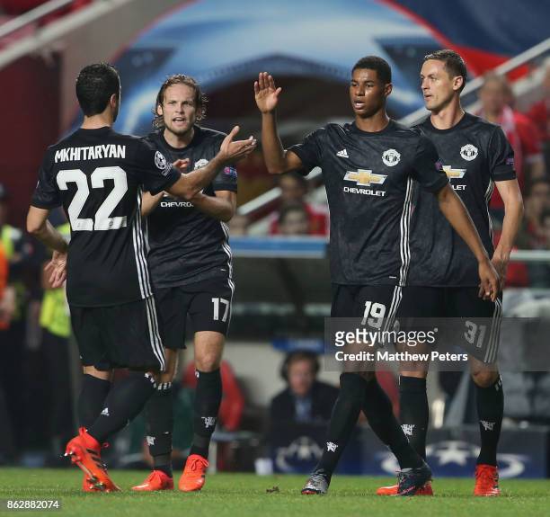 Marcus Rashford of Manchester United celebrates scoring their first goal during the UEFA Champions League group A match between SL Benfica and...
