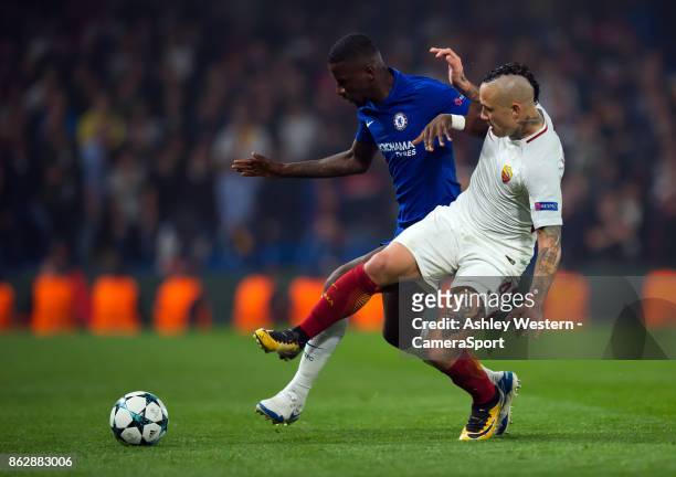 Chelsea's Antonio Rudiger holds off the challenge from Roma's Radja Nainggolan during the UEFA Champions League group C match between Chelsea FC and...