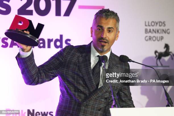 Maajid Nawaz receives a Pink News Broadcast Award during the the PinkNews awards dinner at One Great George Street in London.