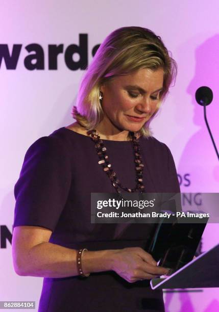 Education Secretary Justine Greening receives jointly with Hannah Bardell the Pink News Politicians of the Year Award during the the PinkNews awards...