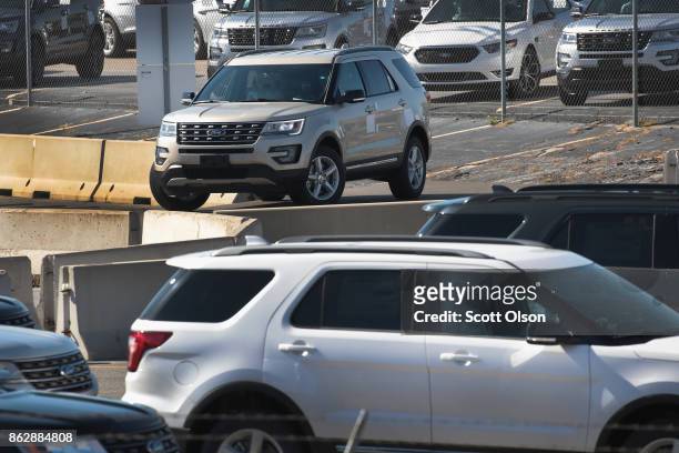 Ford Explorers leave the assembly line at Ford's Chicago Assembly Plant on October 18, 2017 in Chicago, Illinois. Responding to consumer concerns...