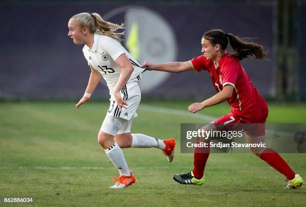 Caroline Siems of Germany is challenged by Zlata Milanovic of Serbia during the international friendly match between U19 Women's Serbia and U19...