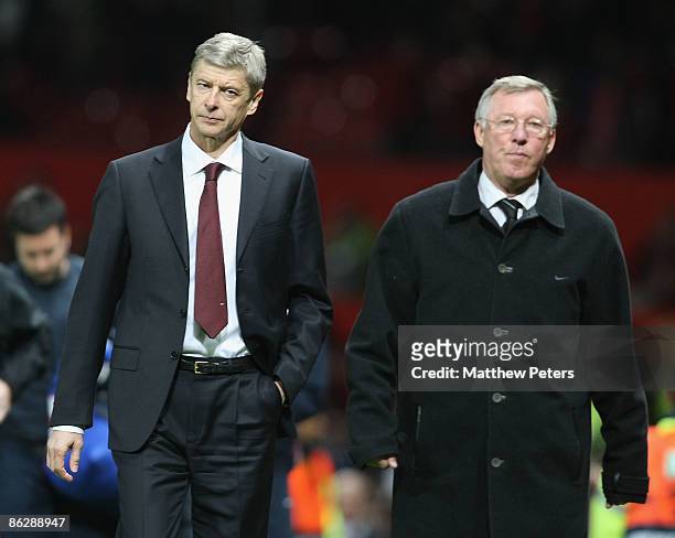 Managers Arsene Wenger of Arsenal and Sir Alex Ferguson of Manchester United walk off, at the final whistle of the UEFA Champions League Semi-Final...