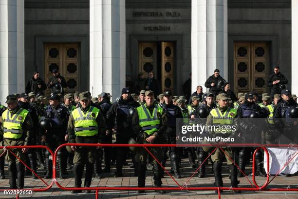 Police guards Ukrainian Parliament in Kyiv, Ukraine, Oct.18, 2017. Dozens Ukrainians set up a tent camp in front of Parliament after a large-scale...