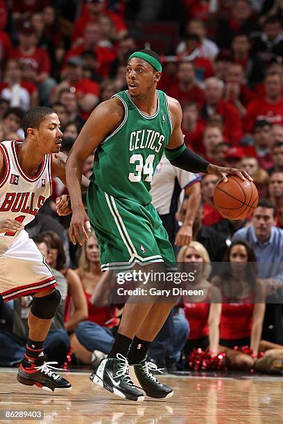 Paul Pierce of the Boston Celtics drives the ball against Derrick Rose of the Chicago Bulls in Game Four of the Eastern Conference Quarterfinals...