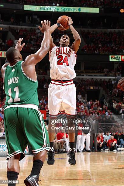 Tyrus Thomas of the Chicago Bulls shoots a jumper against Glen Davis of the Boston Celtics in Game Four of the Eastern Conference Quarterfinals...
