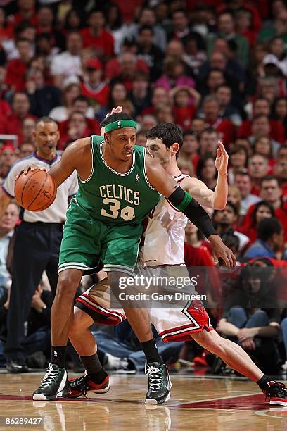 Paul Pierce of the Boston Celtics drives the ball against Kirk Hinrich of the Chicago Bulls in Game Four of the Eastern Conference Quarterfinals...