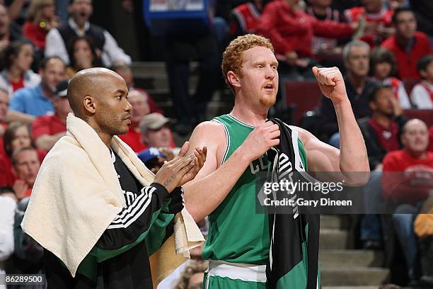 Stephon Marbury and Brian Scalabrine of the Boston Celtics celebrate on the sidelines in Game Four of the Eastern Conference Quarterfinals against...
