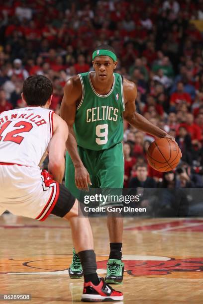 Rajon Rondo of the Boston Celtics drives the ball against Kirk Hinrich of the Chicago Bulls in Game Four of the Eastern Conference Quarterfinals...