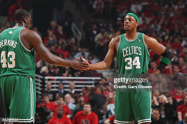 Paul Pierce of the Boston Celtics celebrates with teammate Kendrick Perkins in Game Four of the Eastern Conference Quarterfinals against the Chicago...