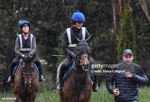 Annie Alexander riding Lord Fandango and Archie Alexander walk back to stables after a trackwork session at Ballarat Turf Club on October 19, 2017 in...