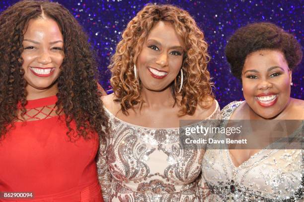 Original Broadway Effie White actress Jennifer Holliday poses onstage with current Effie White actresses Marisha Wallace and Amber Riley of the West...