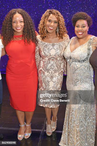Original Broadway Effie White actress Jennifer Holliday poses onstage with current Effie White actresses Marisha Wallace and Amber Riley of the West...