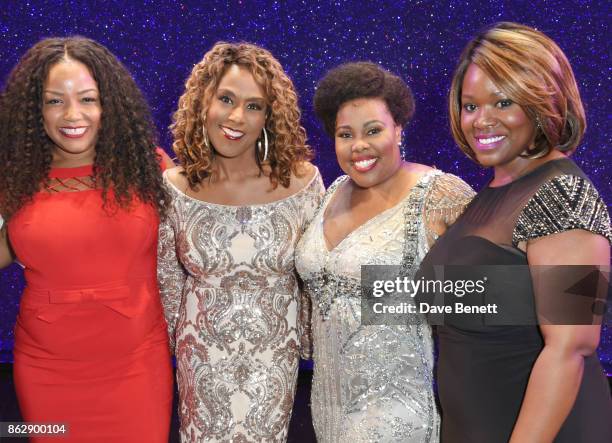 Original Broadway Effie White actress Jennifer Holliday poses onstage with current Effie White actresses Marisha Wallace, Amber Riley and Moya Angela...