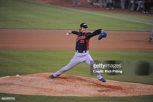 Hisashi Iwakuma of Japan pitches against Cuba during the World Baseball Classic game at Petco Park in San Diego California on March 18, 2009. Japan...