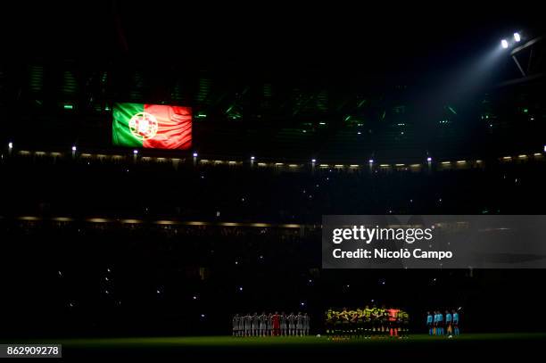 Players of Juventus FC and Sporting CP pay tribute to the victims of fires in Portugal prior to the UEFA Champions League football match between...