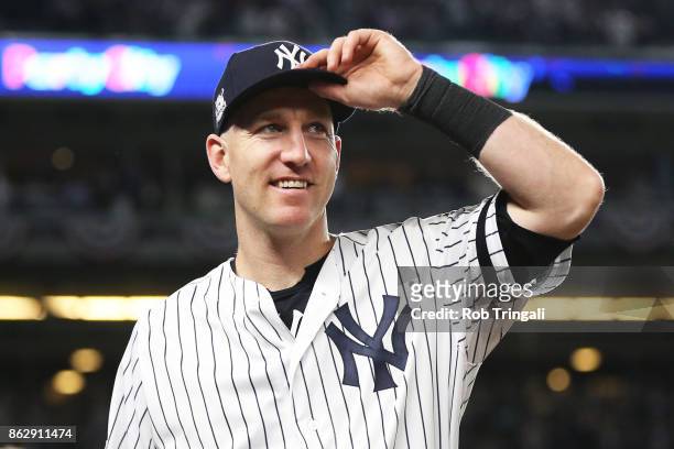Todd Frazier of the New York Yankees acknowledges the crowd after Game 5 of the American League Championship Series against the Houston Astros at...