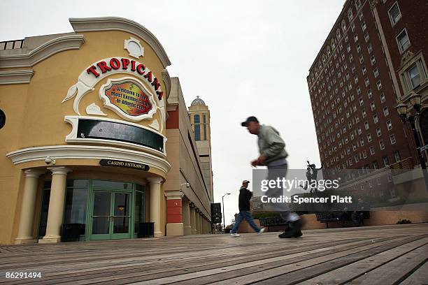 Man runs by the Tropicana Casino Resort on April 29, 2009 in Atlantic City, New Jersey. It was announced on Wednesday that New Jersey regulators have...